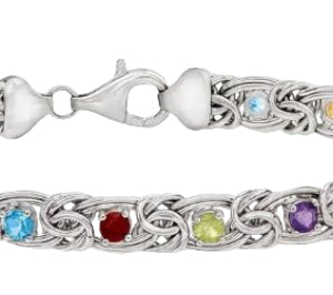Silver bracelet with interwoven design and embedded gemstones on a white background
